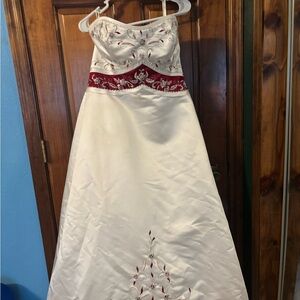 Mori Lee White and Burgundy Embroidered Wedding Dress with long detailed train.